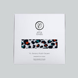 The Etta Loves organic cotton sensory muslin square in its stylish white cardboard packaging. 