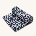 Etta Loves Extra Large Organic Cotton Baby Muslin Square - Purple Leopard. Made from GOTS Organic Cotton, with purple and green sports with a black outline, on a cream background