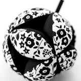 Etta Loves x Liberty organic cotton sensory grasping ball showing Liberty print detail and black inner