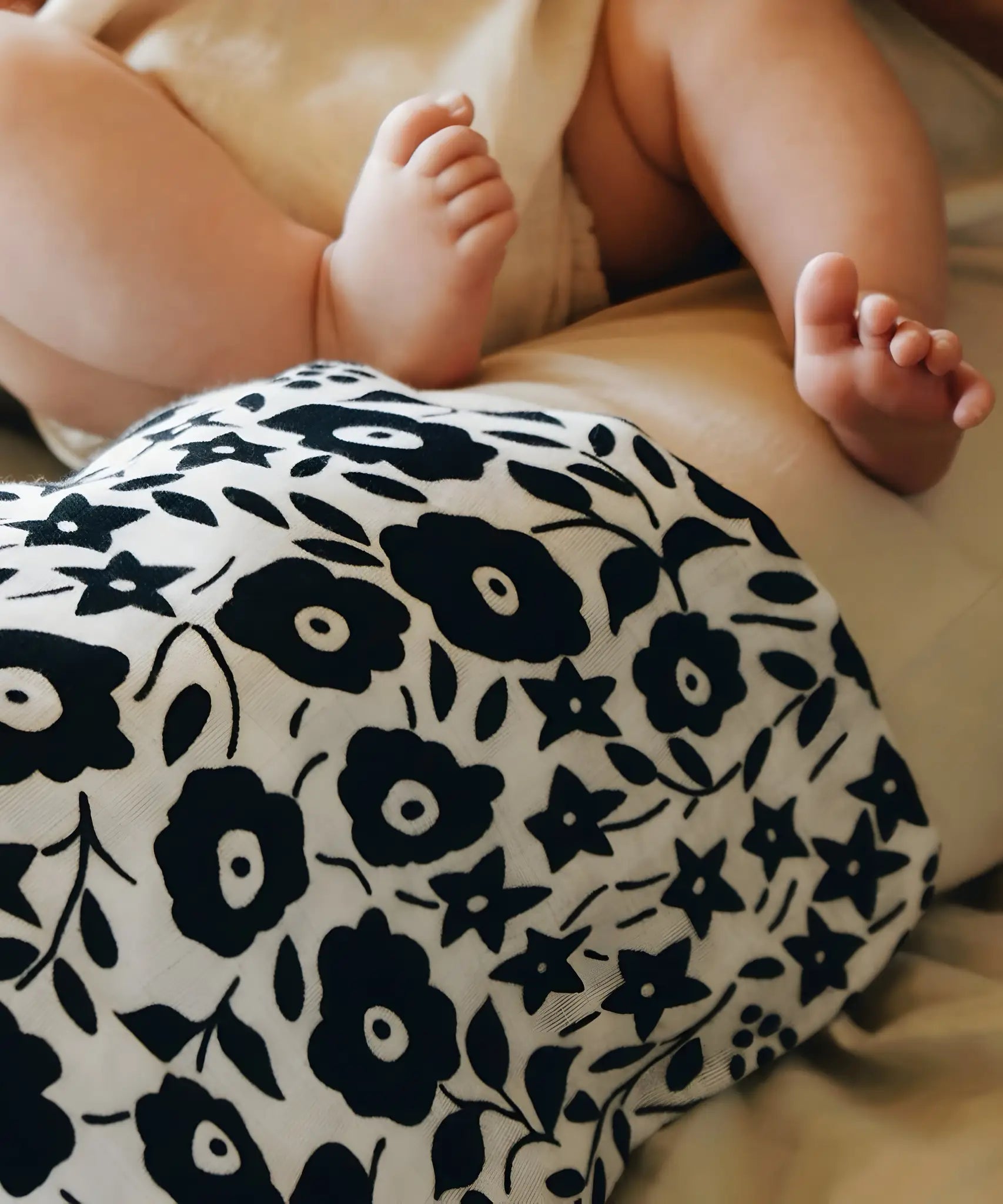 Etta Loves x Liberty muslin squares showing a close up of the monochrome floral design 