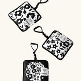 Set of 3 Etta Loves x Liberty hanging squares showing 3 repeating monochrome floral designs 