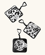Set of 3 Etta Loves x Liberty hanging squares showing 3 repeating monochrome floral designs 