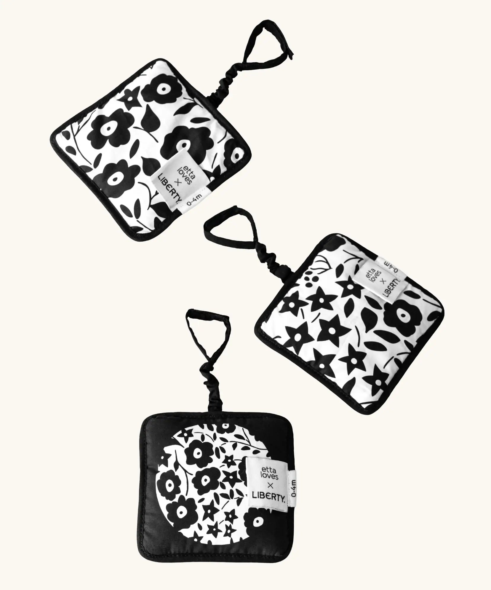 Set of 3 Etta Loves x Liberty hanging squares showing 3 repeating monochrome floral designs 
