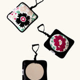 Set of 3 Etta Loves x Liberty hanging squares showing 2 pastel floral designs and a sensory mirror 