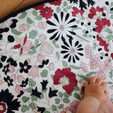 GOTS organic cotton reversible sensory playmat from Etta Loves in collaboration with Liberty showing close up of the Wharfedale Meadow design