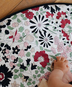 GOTS organic cotton reversible sensory playmat from Etta Loves in collaboration with Liberty showing close up of the Wharfedale Meadow design