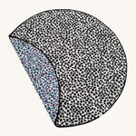 Etta Loves Reversible Organic Cotton Baby Play Mat - Animal Print, with a fun, black, spotty Dalmatian print on one side, and a colourful Leopard print on the other