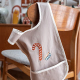 Fabelab kids organic cotton cross back bib with an embroidered candy cane