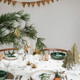 underneath the Fabelab Merry Christmas decorative bunting