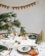 underneath the Fabelab Merry Christmas decorative bunting