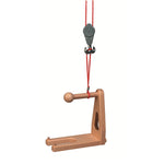 Fagus handmade wooden crane fork attachment handing from a red string on a white background