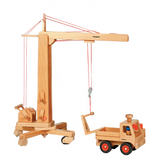 Fagus handmade wooden crane toy. The crane has four wheels on the base.