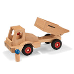  with two wooden peg doll figures. One is inside the dumper truck