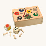 Fagus Handmade Wooden Quapetito Game. The image shows the dice, pegs and colourful illustration on the front of the game/storage box