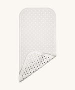 A close up of the Fair Zone natural rubber pearly white bath mat available at Babipur, showing the suckers on the underside for holding the mat down.  