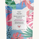 Multicolour leaves fertility tea pouch on a cream background.