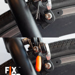 Close up of a frayed phone charged sealed with a FixIts reusable plastic fix strip