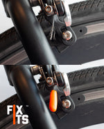 Close up of a frayed phone charged sealed with a FixIts reusable plastic fix strip