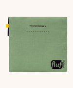 The back of the Fluf Flip Organic Cotton Snack Bag in a moss green colour. A reusable cotton bag with the word 'snack written in black front on the front.