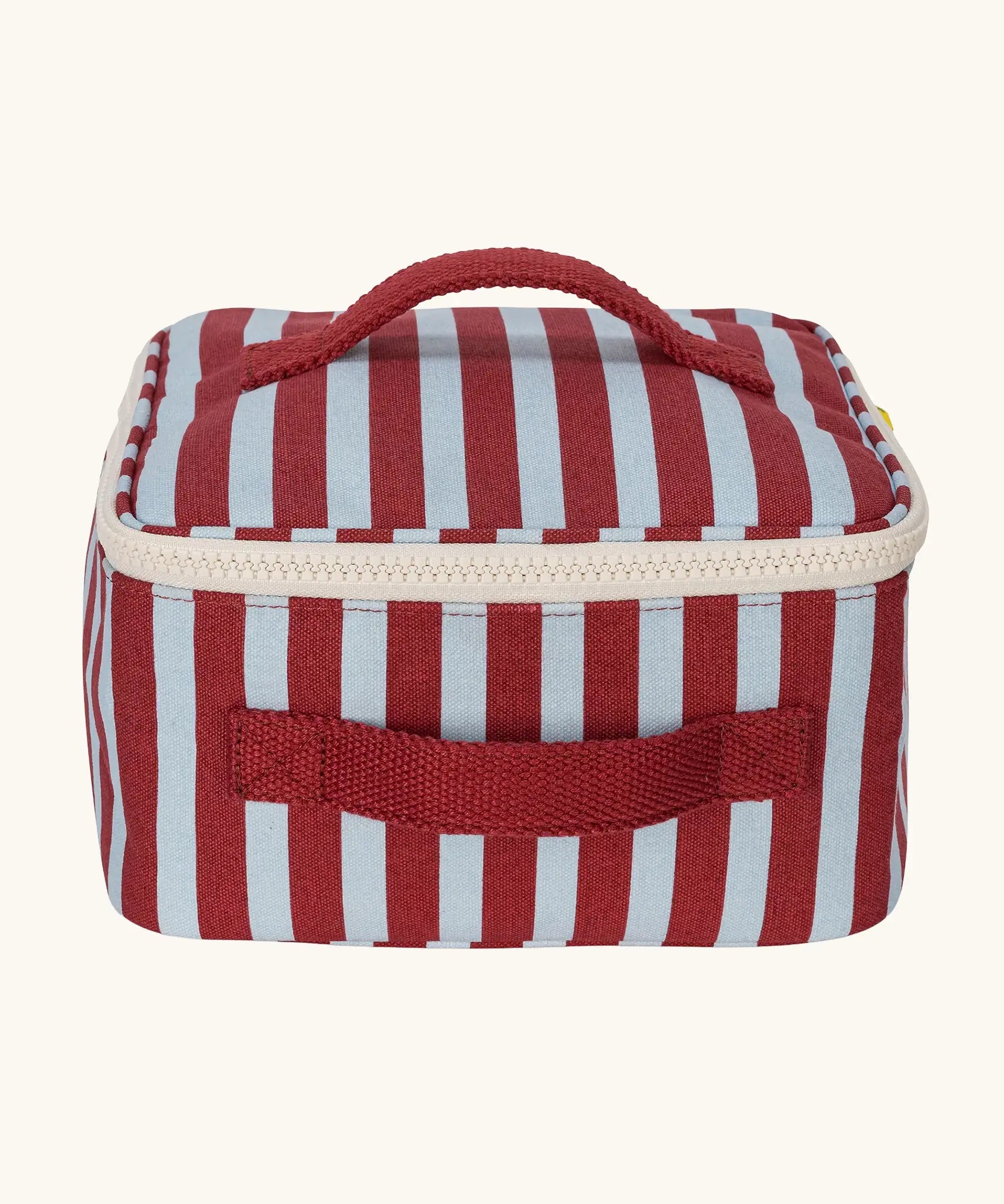 Fluf GOTS organic cotton square lunch bag in a awning stripe chilli pepper design with a white zip detail. Features a matching colour carry handle on the top and side.