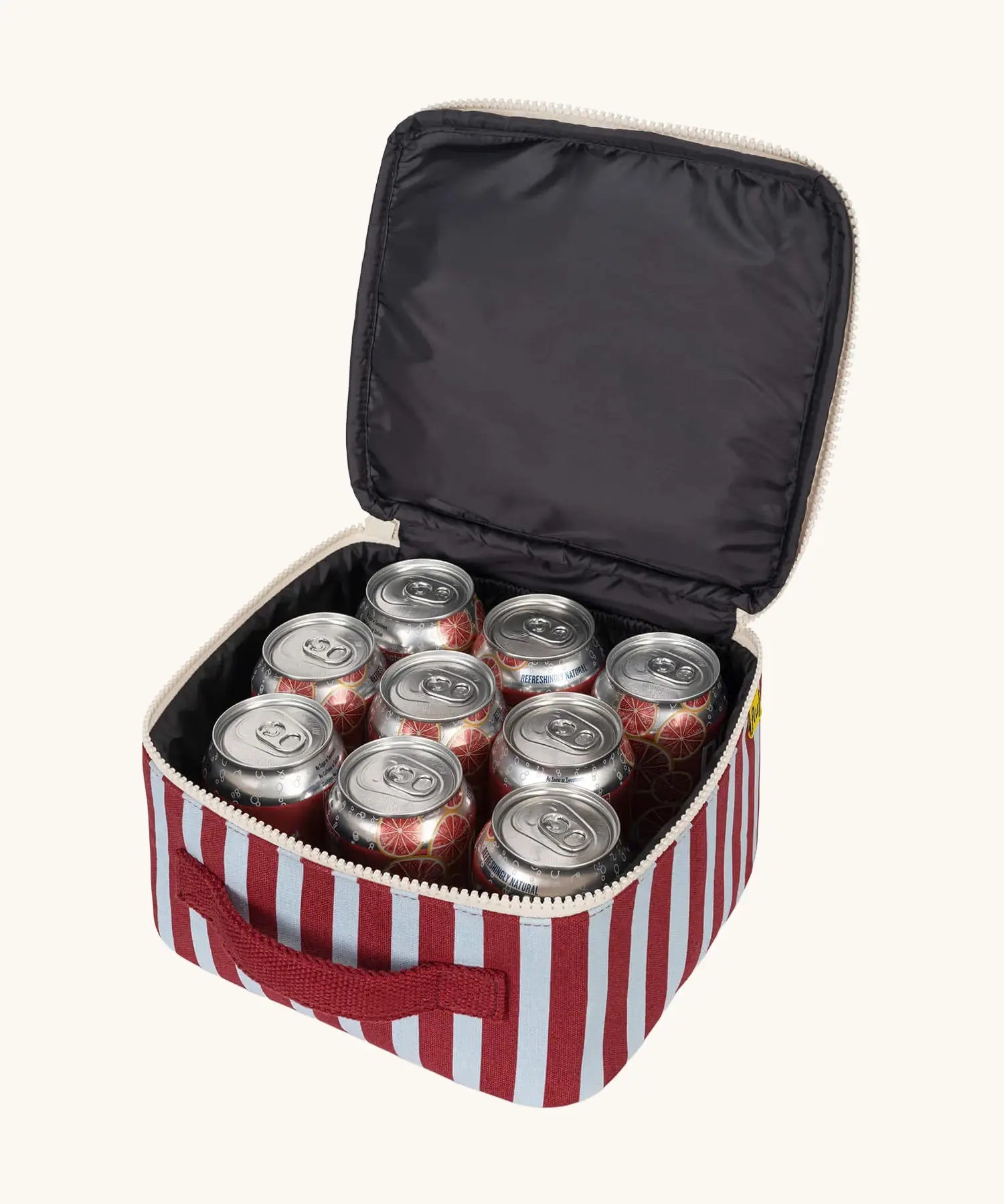 Fluf GOTS organic cotton square lunch bag in a awning stripe chilli pepper design with 9 drinks can placed inside. 