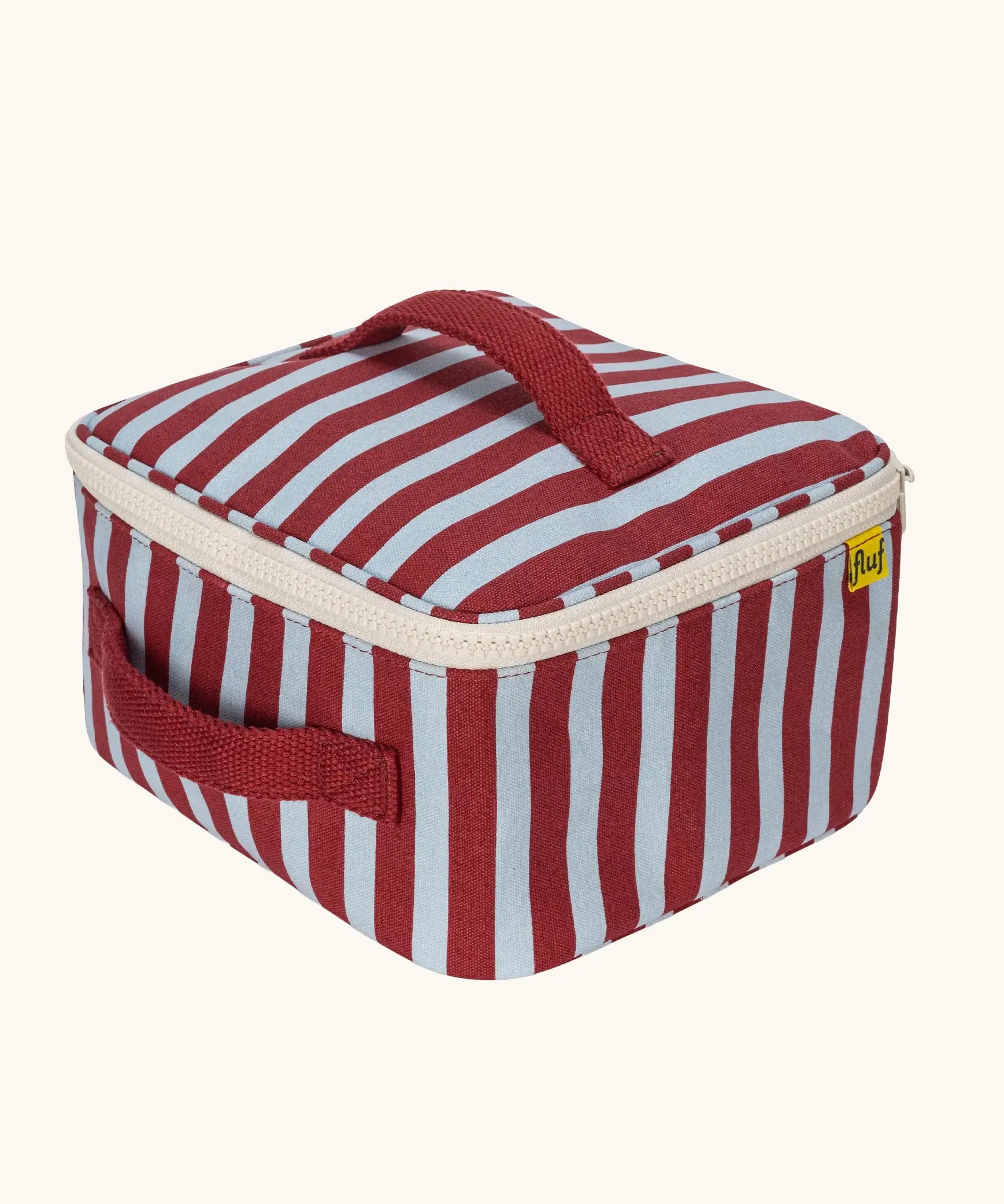 Fluf GOTS organic cotton square lunch bag in a awning stripe chilli pepper design with a white zip detail. Features a matching colour carry handle on the top and side.