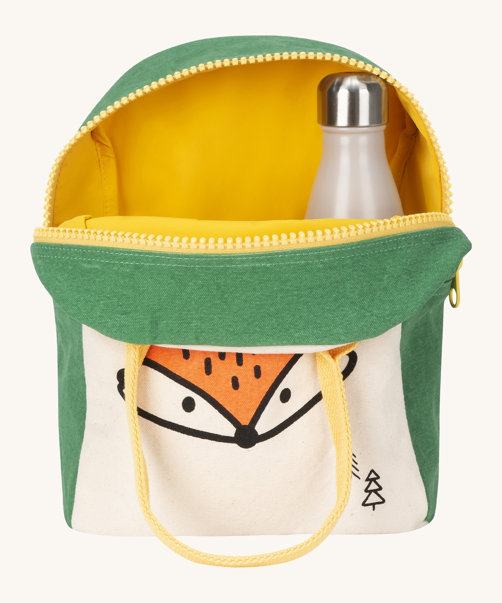 luf zip fox lunch bag inside lining in yellow with a bottle packed inside Outside is a white and green bag with a design of a fox's head on the bottom with a yellow handle and zip detail on a cream background. 