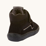 The back of the Froddo Barefoot TEX Kids Autumn Shoes in Black. A soft ankle high shoe in black with a barefoot black rubber sole. Features two velcro straps for a secure fit.  We have a range of children's barefoot shoes available at Babipur. 
