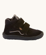 The side of the Froddo Barefoot TEX Kids Autumn Shoes in Black. A soft ankle high shoe in black with a barefoot black rubber sole. Features two velcro straps for a secure fit.  We have a range of children's barefoot shoes available at Babipur. 