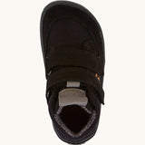 A view from above of the Froddo Barefoot TEX Kids Autumn Shoes in Black showing the wide toe box at the front. A soft ankle high shoe in black with a barefoot black rubber sole. Features two velcro straps for a secure fit.  We have a range of children's barefoot shoes available at Babipur. 