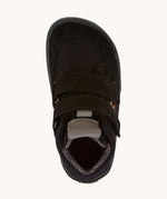 A view from above of the Froddo Barefoot TEX Kids Autumn Shoes in Black showing the wide toe box at the front. A soft ankle high shoe in black with a barefoot black rubber sole. Features two velcro straps for a secure fit.  We have a range of children's barefoot shoes available at Babipur. 