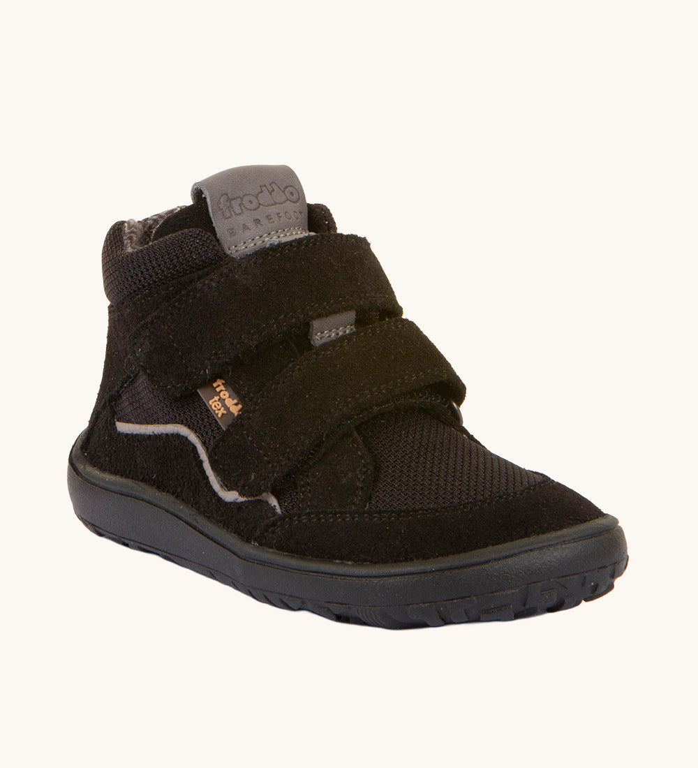 Froddo Barefoot TEX Kids Autumn Shoes in Black. A soft ankle high shoe in black with a barefoot black rubber sole. Features two velcro straps for a secure fit.  We have a range of children's barefoot shoes available at Babipur. 