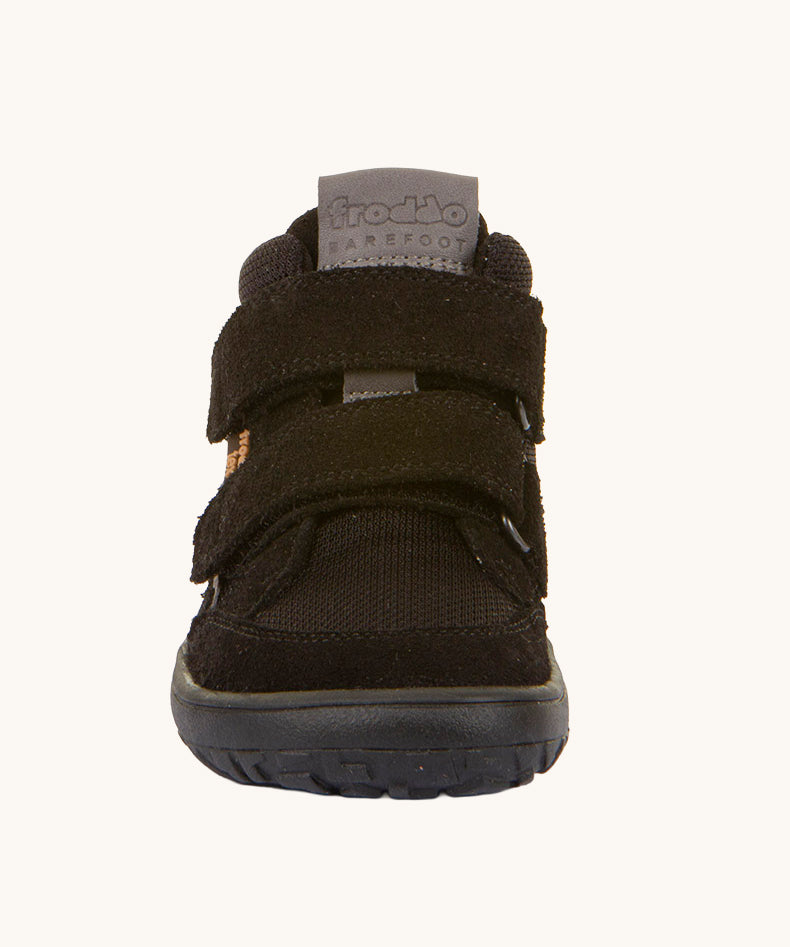 The front of the Froddo Barefoot TEX Kids Autumn Shoes in Black. A soft ankle high shoe in black with a barefoot black rubber sole. Features two velcro straps for a secure fit.  We have a range of children's barefoot shoes available at Babipur. 
