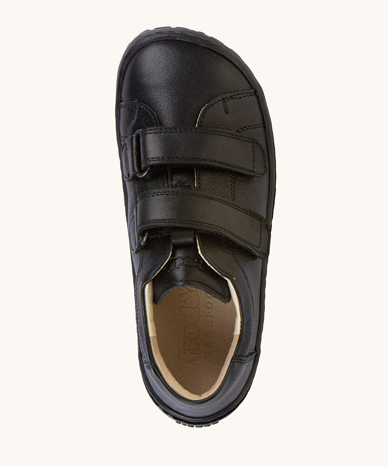 A view from, above of the Froddo Barefoot Black Alex Kids Leather School Shoes. A black leather child's school shoe with two velcro strap fastenings with a barefoot sole. We have a range of children's barefoot shoes available at Babipur. 