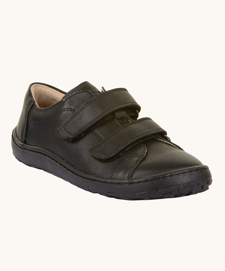 Froddo Barefoot Black Alex Kids Leather School Shoes. A black leather child's school shoe with two velcro strap fastenings with a barefoot sole. We have a range of children's barefoot shoes available at Babipur. 