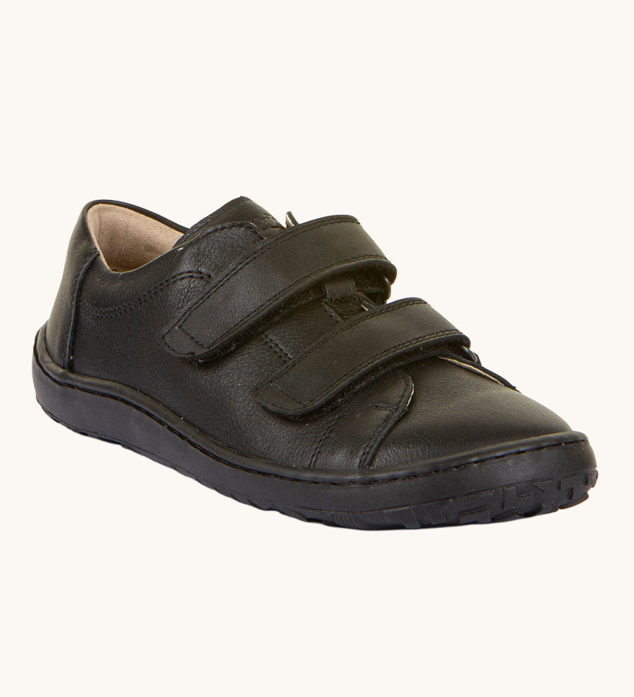 Froddo Barefoot Black Alex Kids Leather School Shoes. A black leather child's school shoe with two velcro strap fastenings with a barefoot sole. We have a range of children's barefoot shoes available at Babipur. 