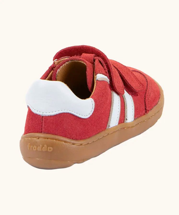 View of back of the Froddo barefoot f-motion kids shoes in red with white stripe design on the side has 2 velcro fasteners and a flexible rubber sole.