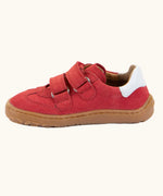 Side view of the Froddo barefoot f-motion kids shoes in red with white stripe design on the side has 2 velcro fasteners and a flexible rubber sole.