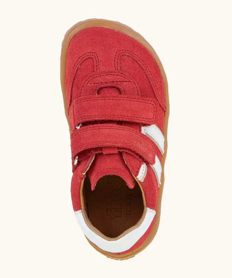 Birds eye view of Froddo barefoot f-motion kids shoes in red with white stripe design on the side has 2 velcro fasteners and a flexible rubber sole.