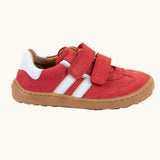 Froddo barefoot f-motion kids shoes in red with white stripe design on the side has 2 velcro fasteners and a flexible rubber sole.