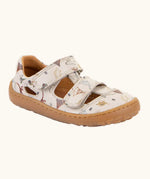 Froddo barefoot kids sandals in beige with a dinosaur themed outline print.