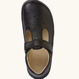 Top view of Froddo natural leather barefoot children's shoe in black showing velcro strap fastener and cut out decoration