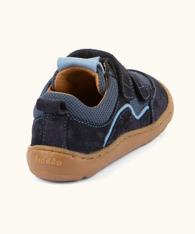 Froddo barefoot base children's shoe in dark blue. A trainer showing a pull tab on the back and padded ankle support