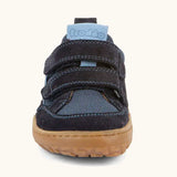 Front of  Froddo barefoot base children's shoe in dark blue showing the 2 velcro fasteners and the grey rubber sole