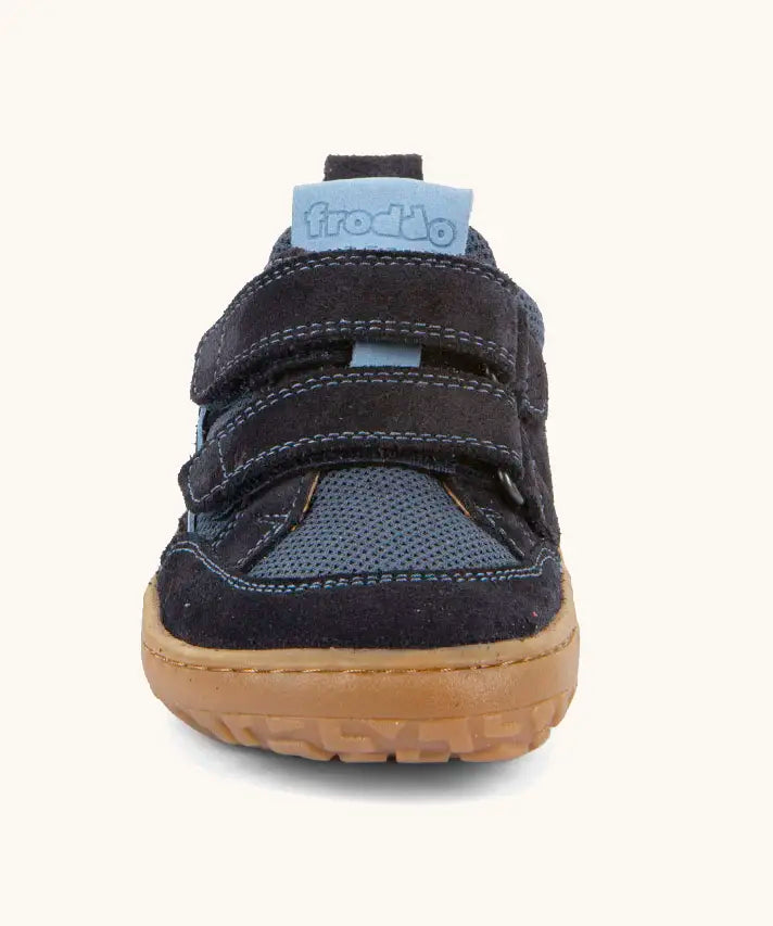 Front of  Froddo barefoot base children's shoe in dark blue showing the 2 velcro fasteners and the grey rubber sole