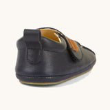 The back of the Froddo barefoot walker baby shoe in dark blue available at Babipur showing padded ankle support and pull tab detail