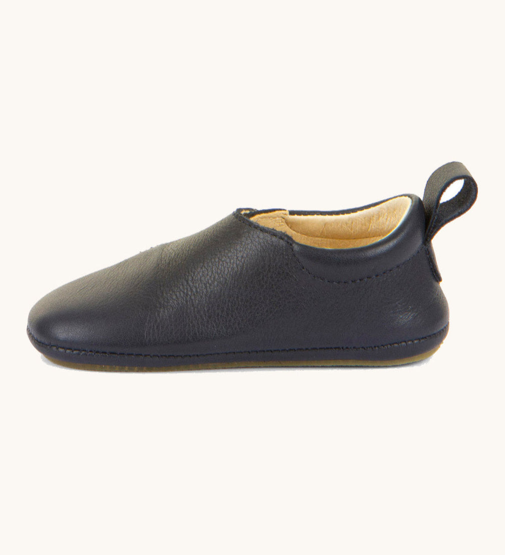 Froddo barefoot walker baby shoe in dark blue available at Babipur showing the pull tab on the back for easy fitting and the padded ankle support