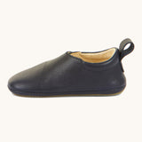 Froddo barefoot walker baby shoe in dark blue available at Babipur showing the pull tab on the back for easy fitting and the padded ankle support