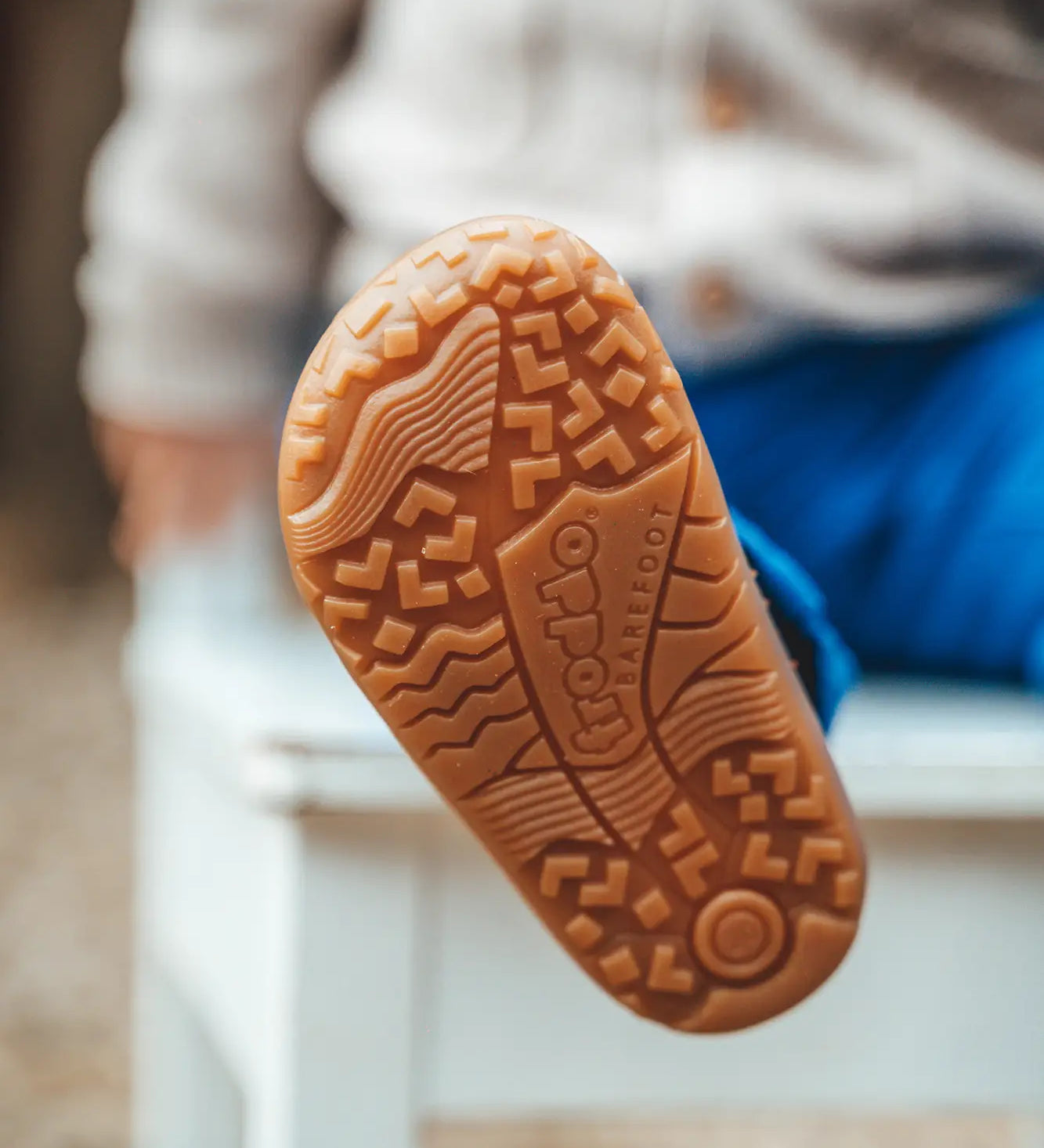 Tread detail on the brown natural rubber flexible sole for Froddo kids barefoot shoes