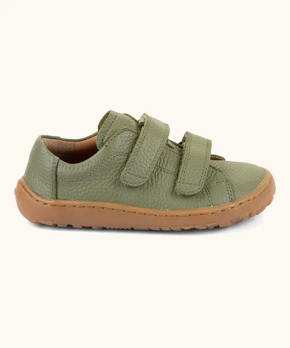 Side of Froddo barefoot base children's shoe in green showing the 2 velcro fasteners 